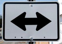 road sign pointing in both directions