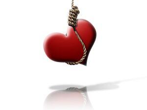 red love heart hanging from a rope