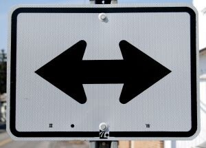 indecisive road sign