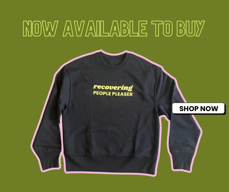 Black ‘recovering people pleaser’ sweatshirt by Natalie Lue Baggage Reclaim with neon yellow writing on a green background. Now available to buy. Shop Now